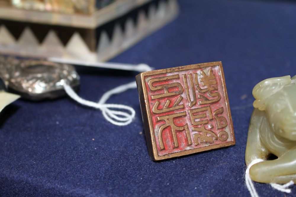 A Chinese bronze inscribed scholars seal, 4cm sq.
